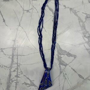 Bold Blue Multi-Strand Beaded Necklace with Artistic Pendant